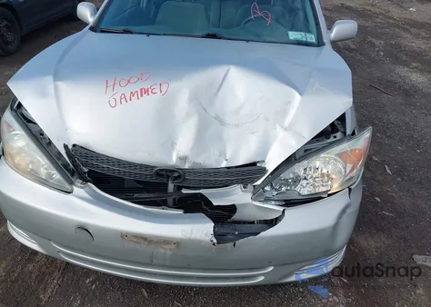 2003 Toyota Camry Le z USA, uszkodzony, nr VIN 4T1BE32K03U235551